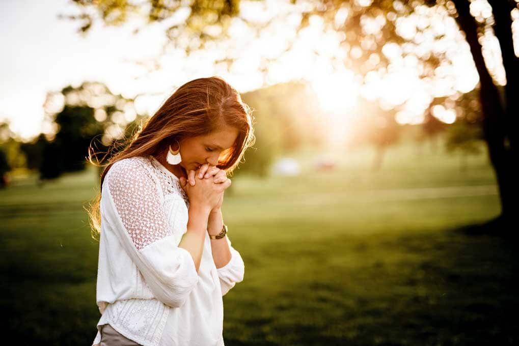 women is praying 