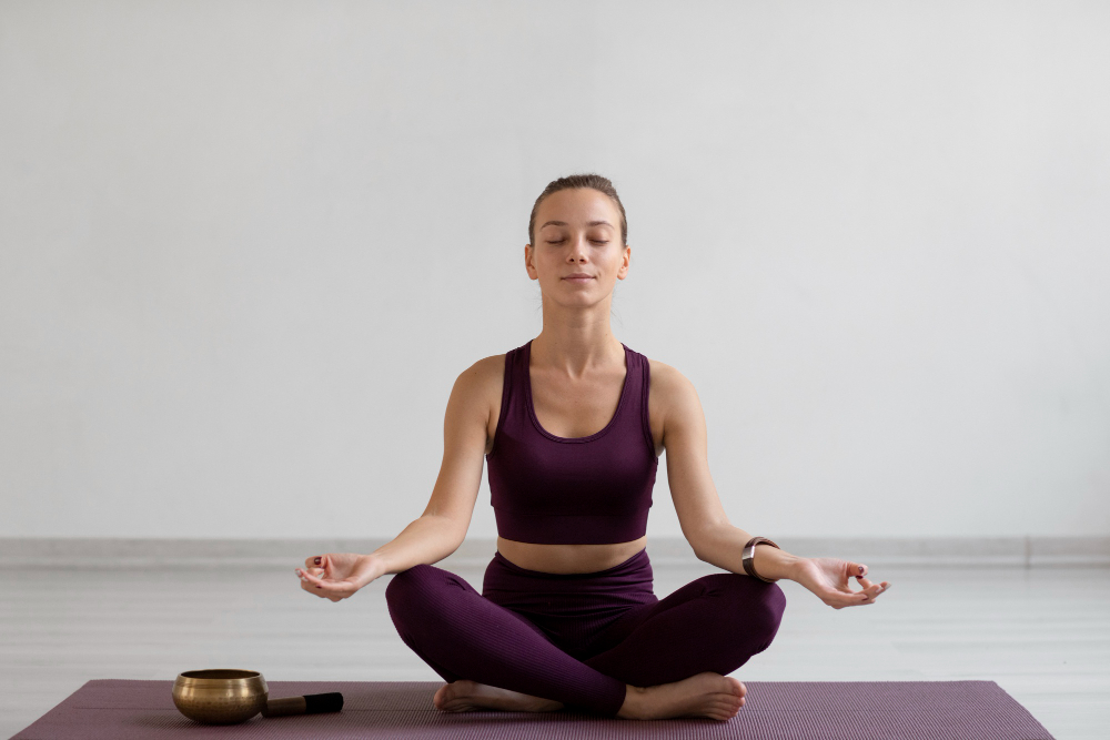 young woman practicing meditation